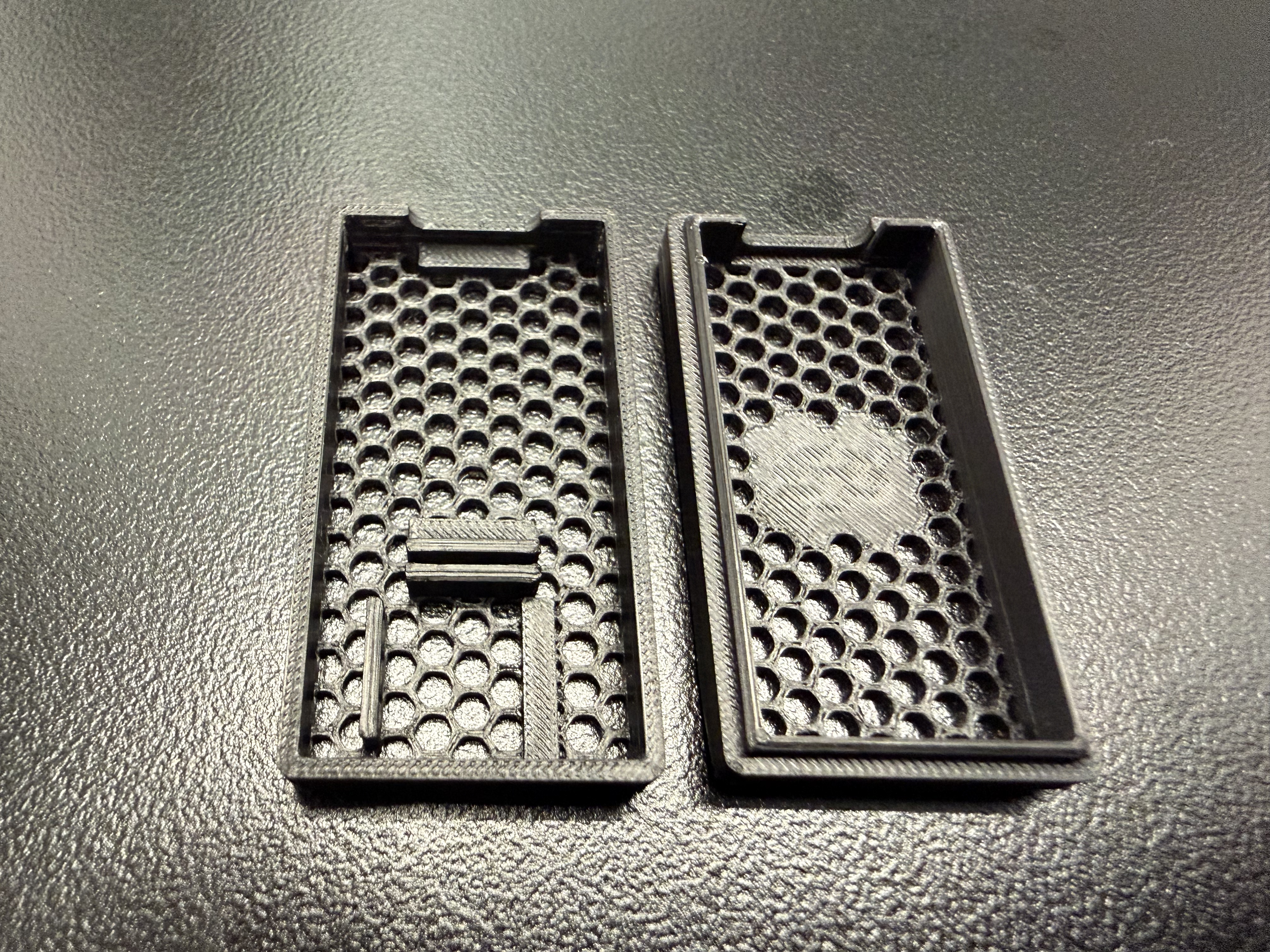 3D-printed enclosure, showing honeycomb lids
